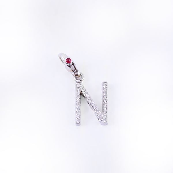 * 18KT GOLD PENDANT SET WITH DIAMONDS AND A CABOCHON-CUT RUBY, BY PASQUALE BRUNI