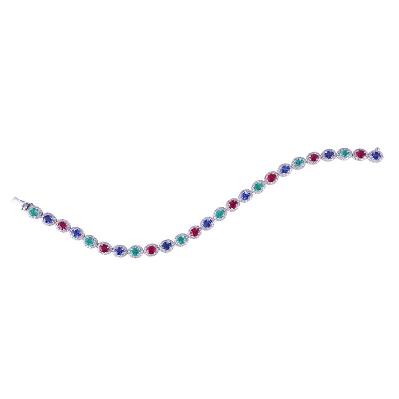 Bracciale, oro bianco 18 kt con zaffiri, rubini e smeraldi ovali alternati