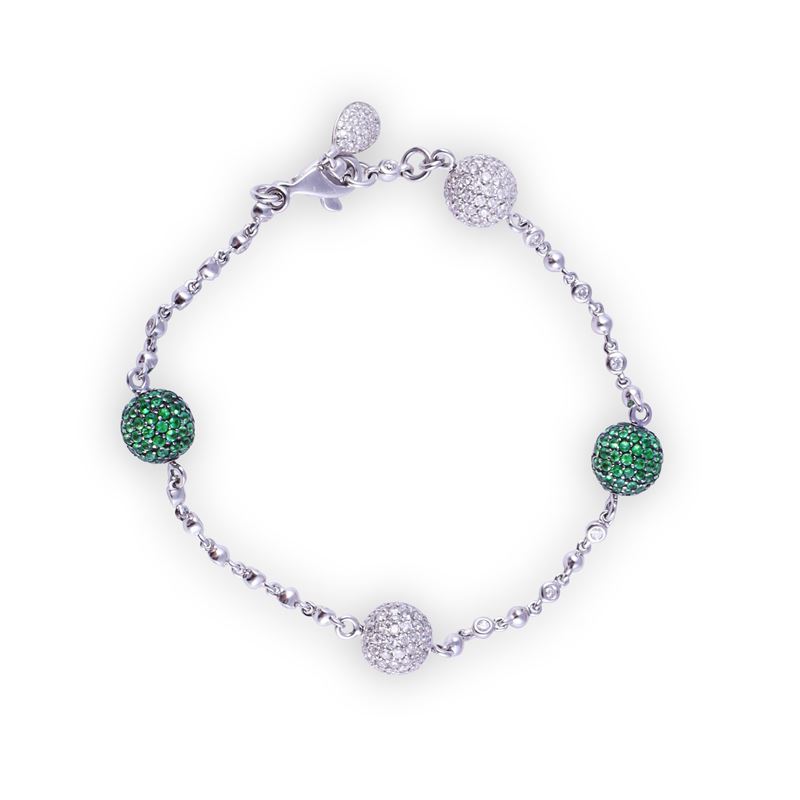 Bracciale, oro bianco e brunito 18 kt con brillanti e tsavoriti