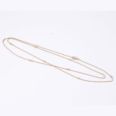 Catenina lunga in oro giallo 18 kt a maglia rollina con brillanti
