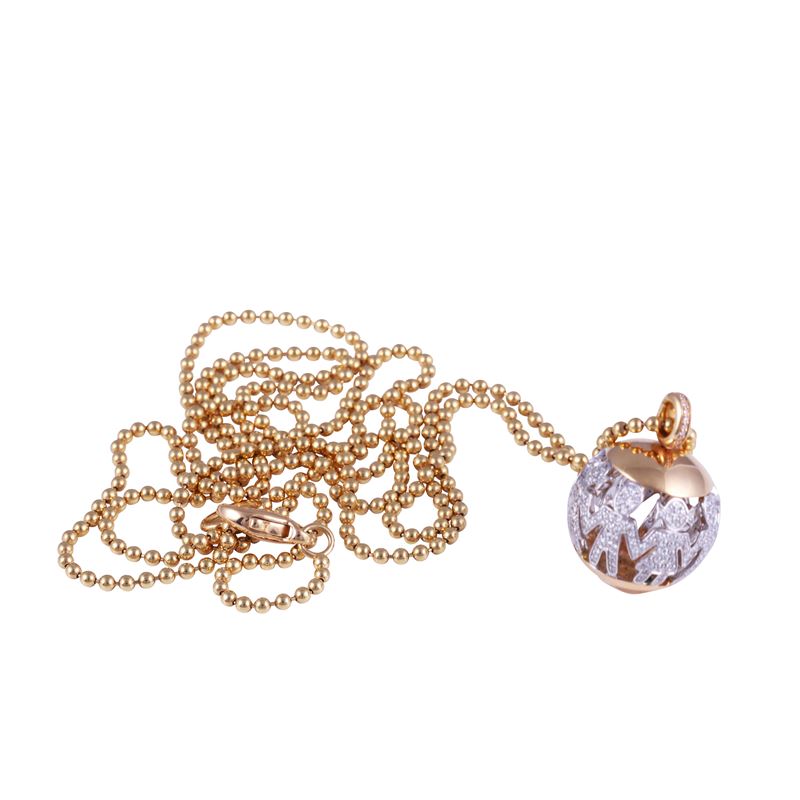 Collana in oro 18 kt con pendente a sfera traforata e pavé di brillanti