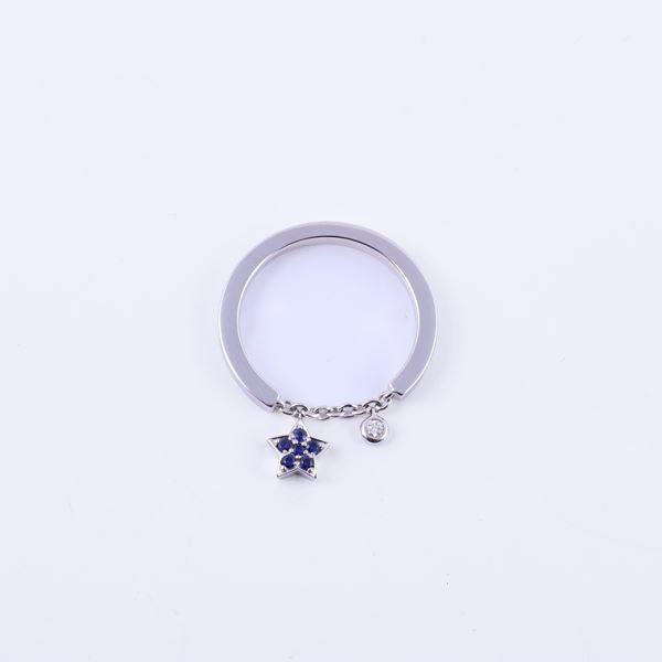 * 18KT GOLD RING WITH SAPPHIRES AND DIAMOND