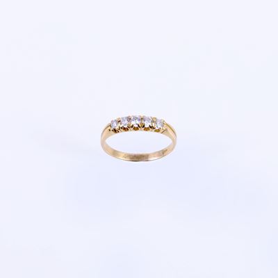 Anello a rivière, oro giallo 18 kt con brillanti