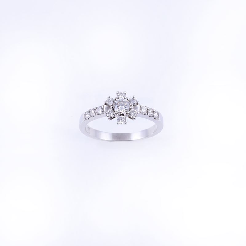 Anello, oro bianco 18 kt con motivo centrale a rosone in brillanti