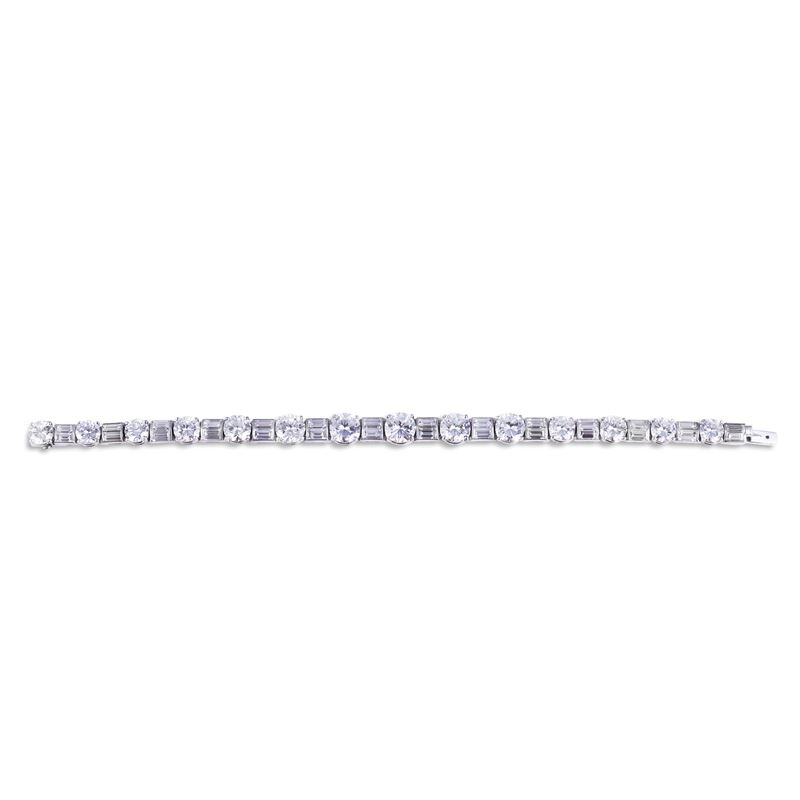 Rivière in platino con brillanti e diamanti baguette