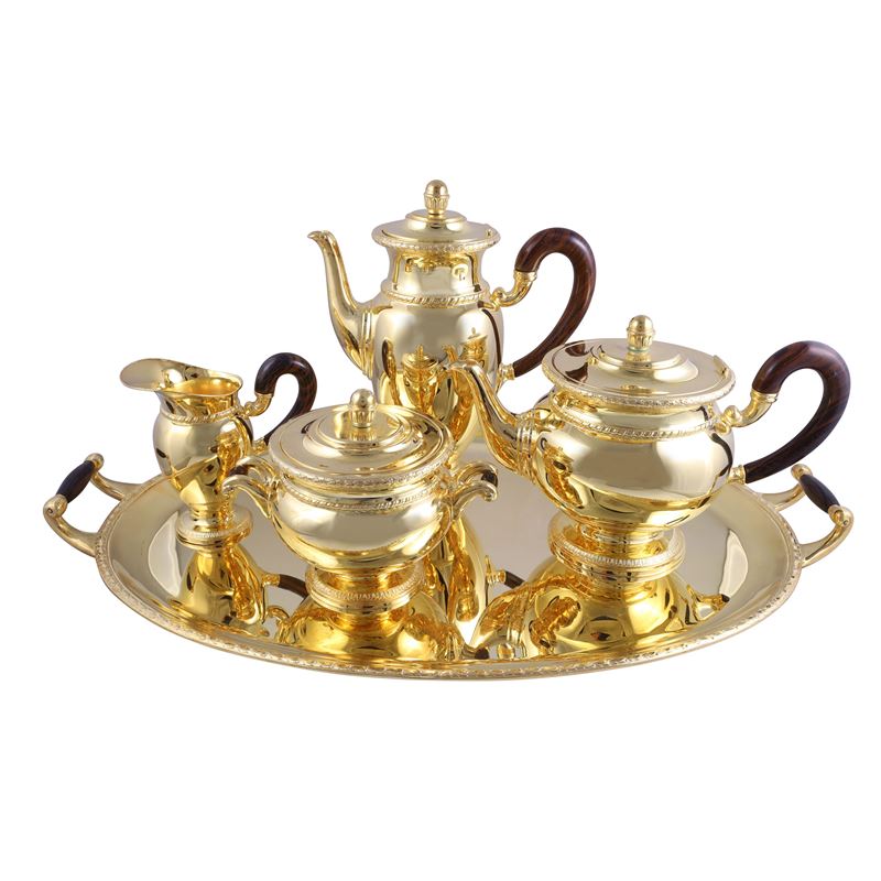 Servizio da tè e caffè, argento 800/1000 dorato con finiture a palmette e prese sagomate