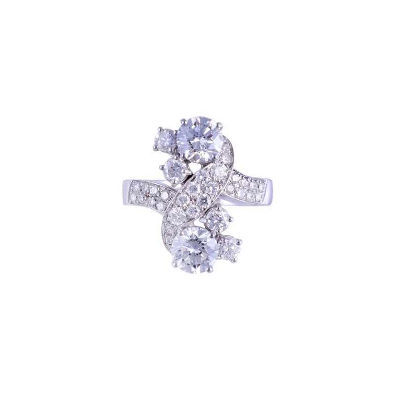 Anello in oro bianco 18 kt con brillanti, due pietre principali contrapposte