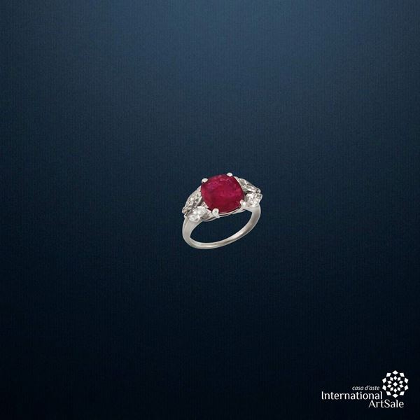 Anello in O.B. con rubino e diamanti. Allegata analisi. Custodia...